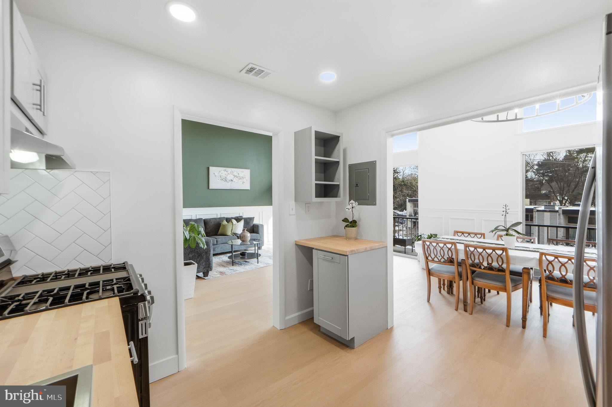 14427 Parkvale Road, Unit 7 Rockville, MD 20853 - Photo 13 of 43 Bright and airy kitchen with outdoor views.