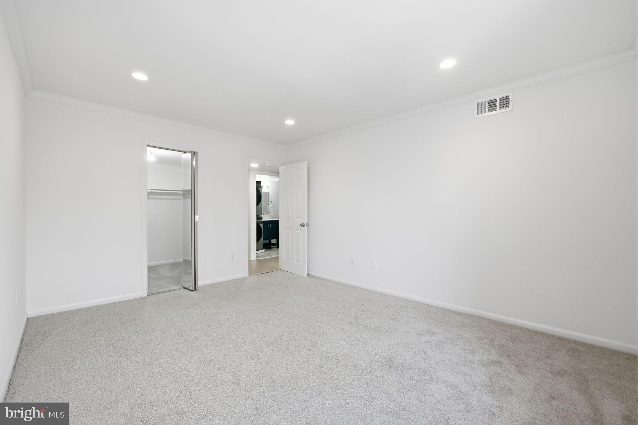 14427 Parkvale Road, Unit 7 Rockville, MD 20853 - Photo 23 of 43 Spacious, light-filled room ready for personali...