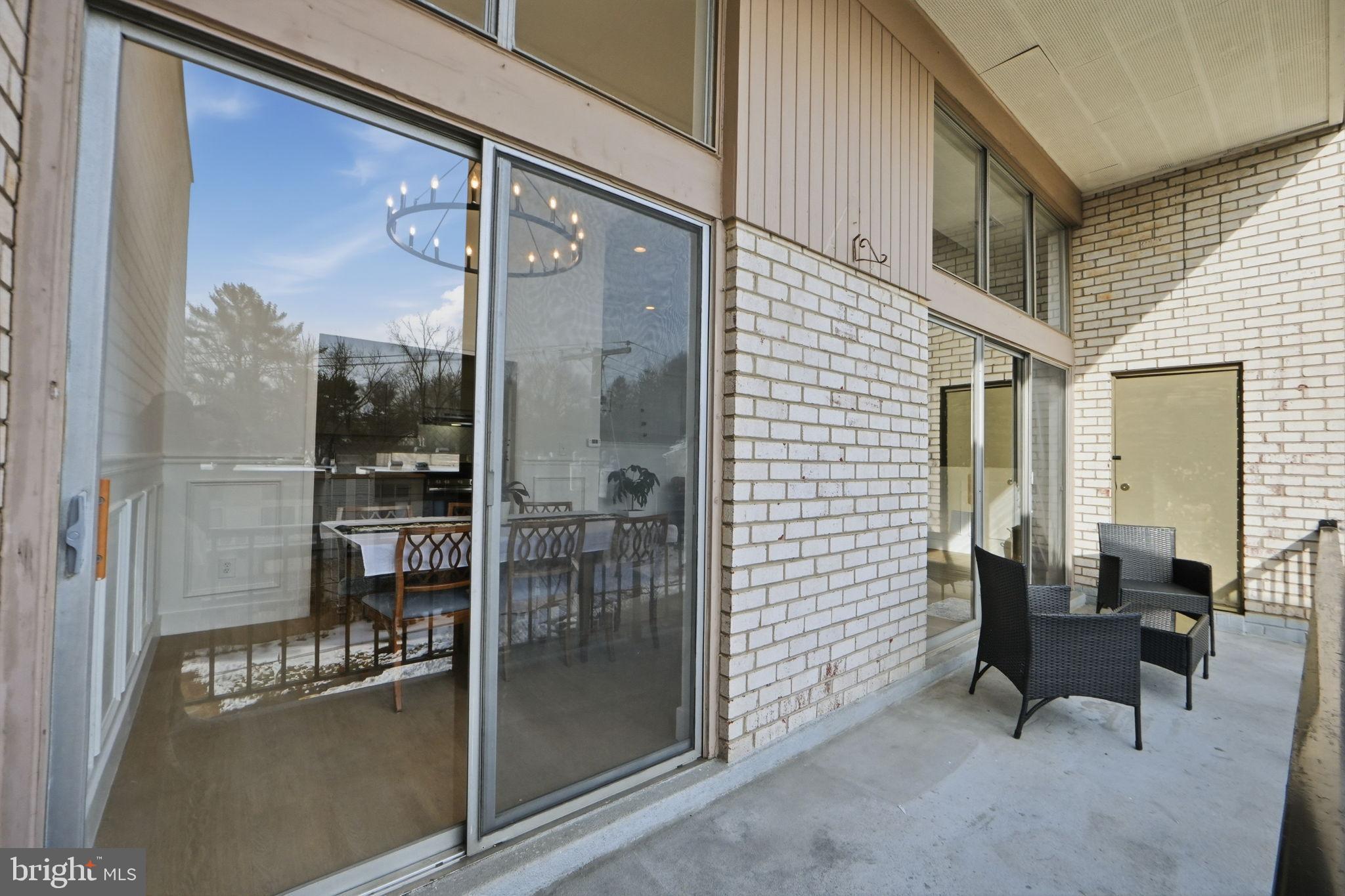 14427 Parkvale Road, Unit 7 Rockville, MD 20853 - Photo 26 of 43 Stylish balcony with serene views.
