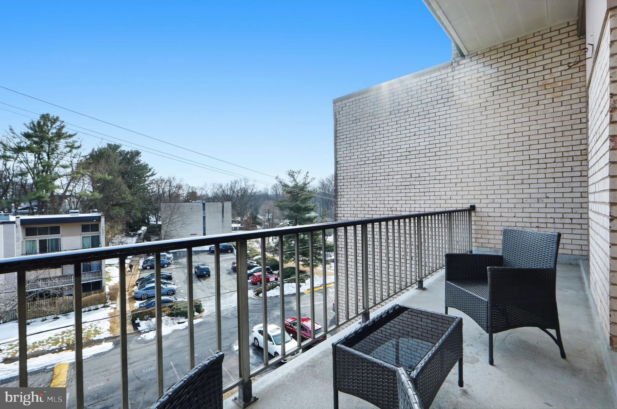 14427 Parkvale Road, Unit 7 Rockville, MD 20853 - Photo 27 of 43 Sunny balcony with serene views.