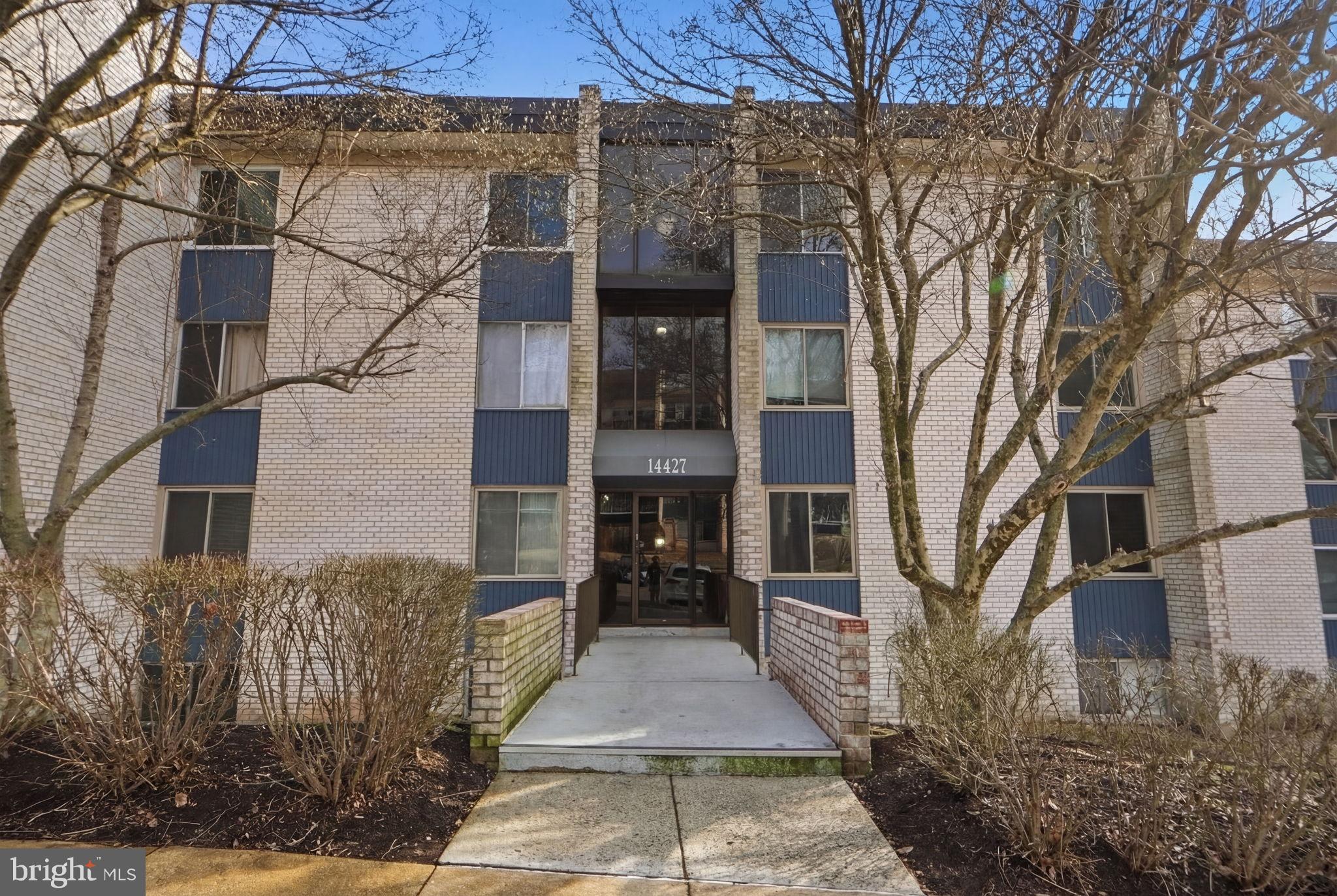 14427 Parkvale Road, Unit 7 Rockville, MD 20853 - Photo 32 of 43 Charming entrance to a modern residence.