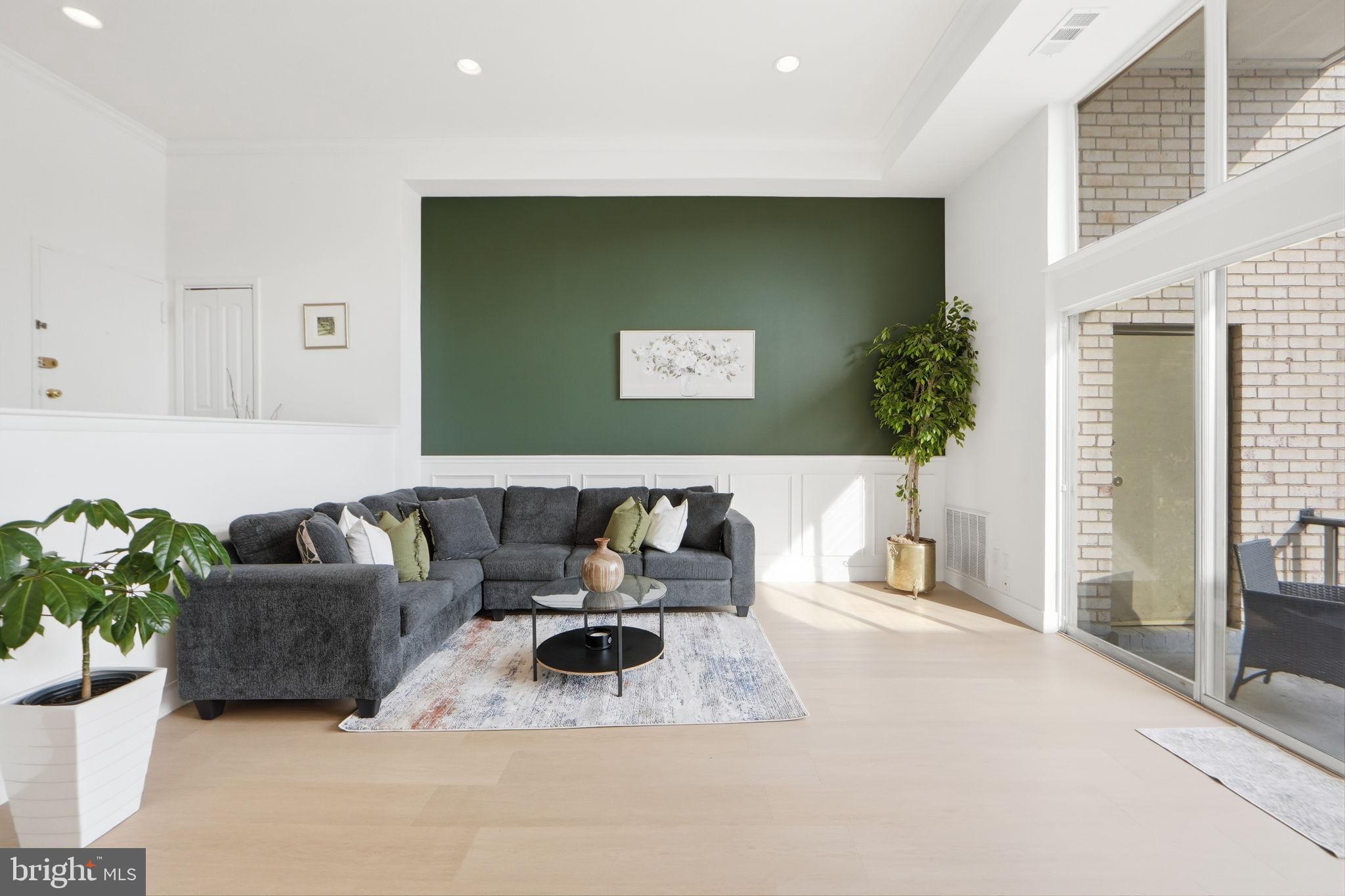 14427 Parkvale Road, Unit 7 Rockville, MD 20853 - Photo 4 of 43 Modern living space with vibrant green accent.