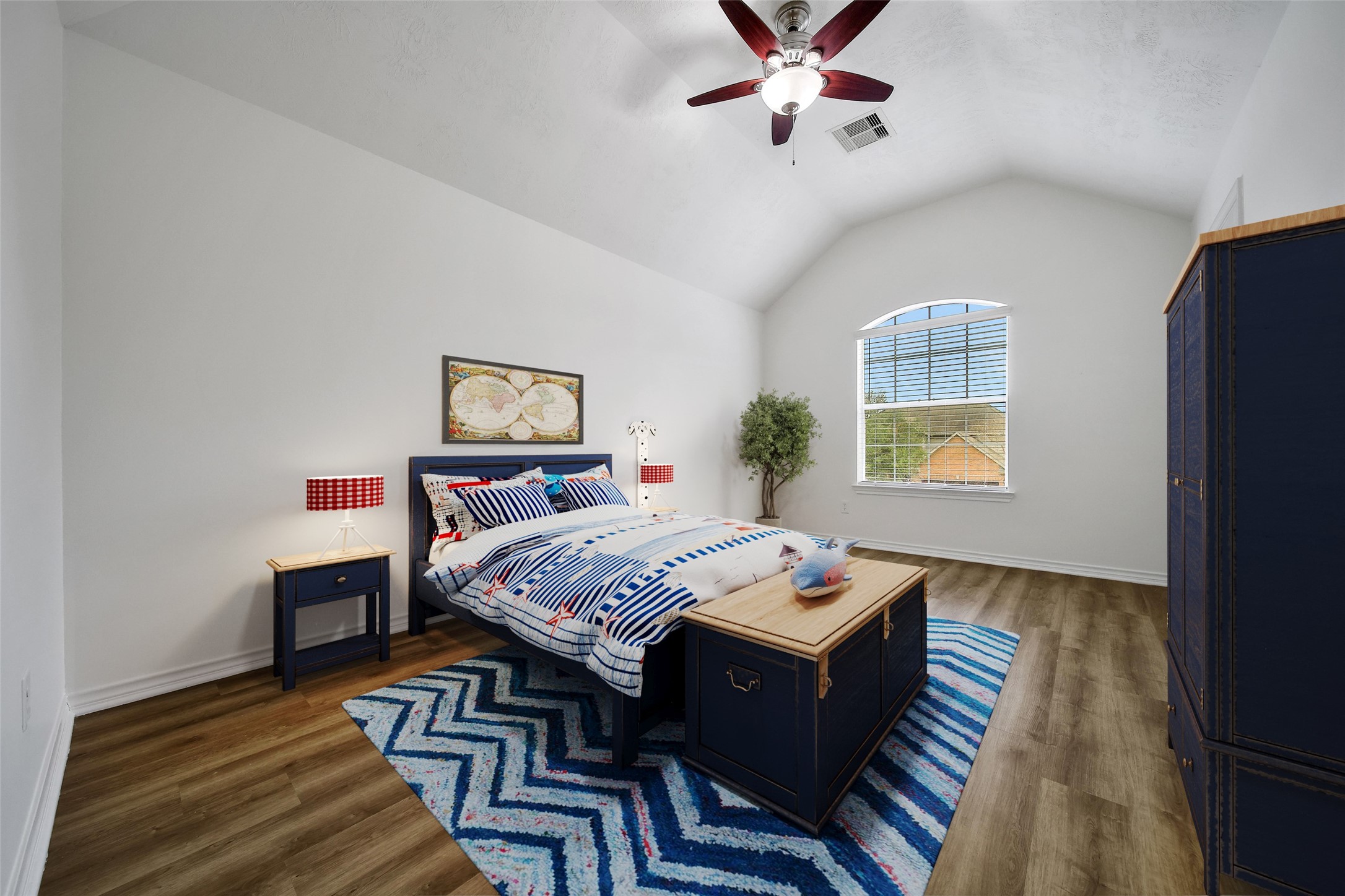 714 Stubbs Bend Drive Rosenberg, TX 77469 - Photo 37 of 42 a bedroom with a bed and wooden floor