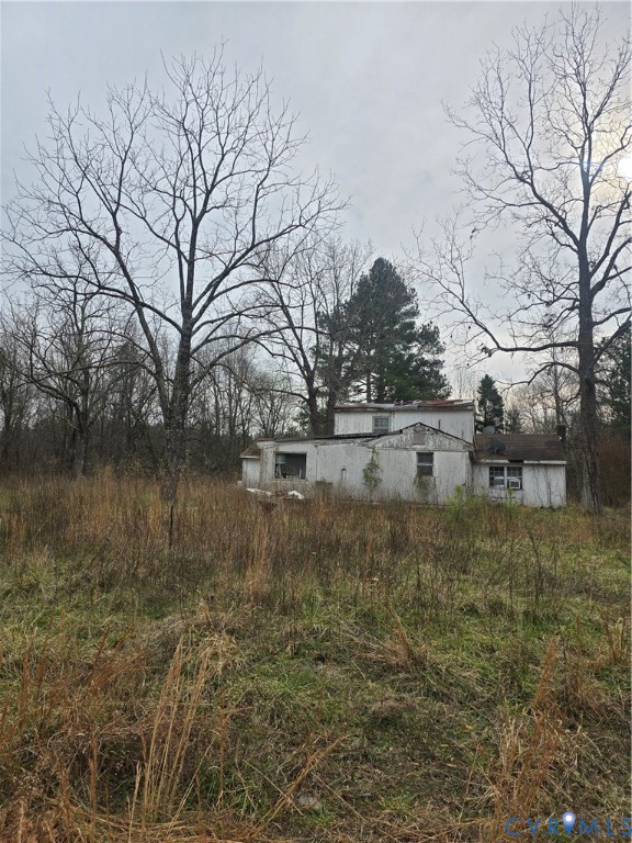 1402 Lewis Level Road Tappahannock, VA 22560 - Photo 13 of 14 a view of lake with a building