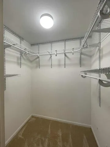 a view of a room with racks on the wall