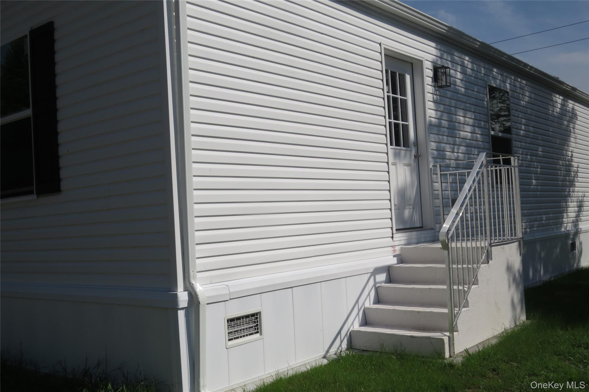 723 Beekman Road, Unit 35 Hopewell Junction, NY 12533 - Photo 16 of 16 a view of a house with a white door