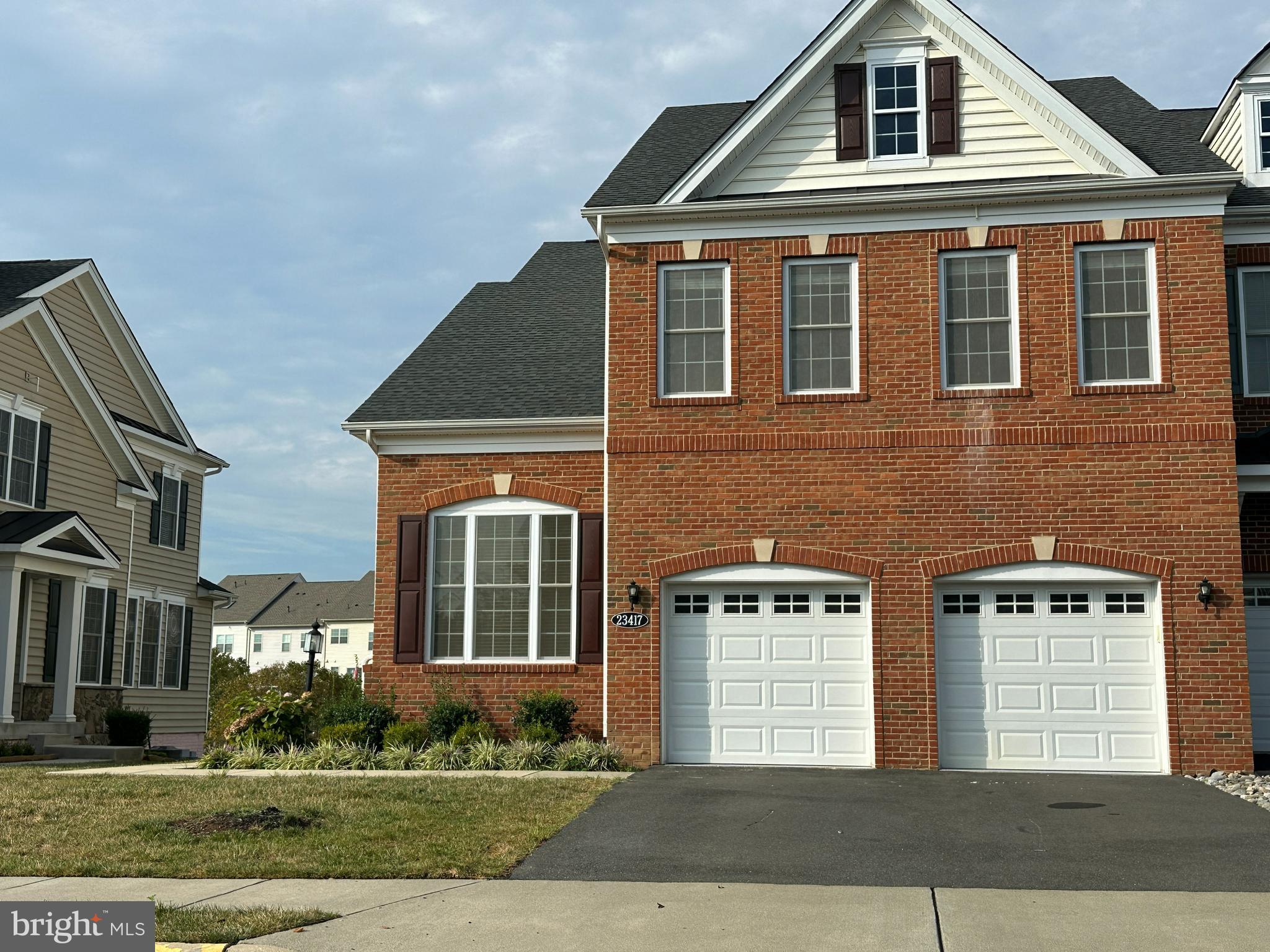 23417 Longollen Woods Terrace Ashburn, VA 20148 - Photo 1 of 43 a front view of a house