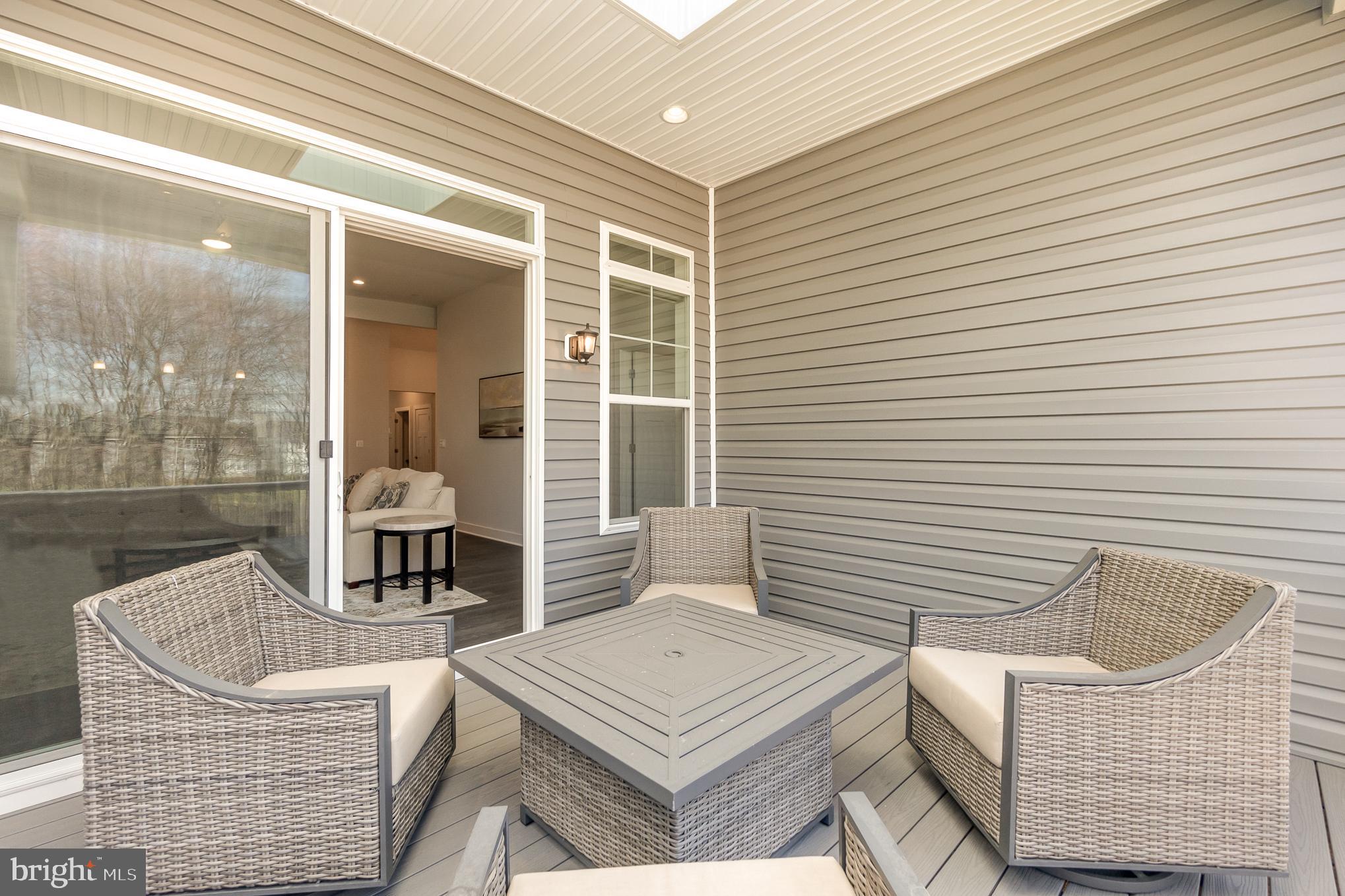 114 Loblolly Lane Fallston, MD 21047 - Photo 12 of 33 Covered deck with skylight and recess lighting