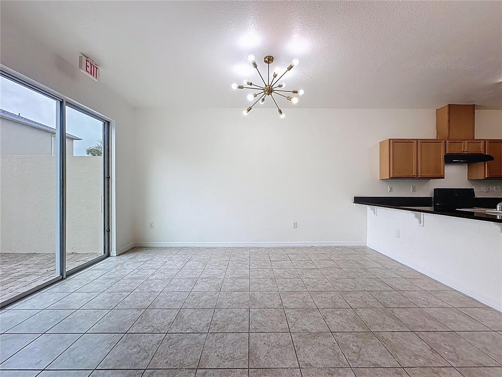 3135 Tocoa Circle Kissimmee, FL 34746 - Photo 11 of 36 a view of an empty room with a fan