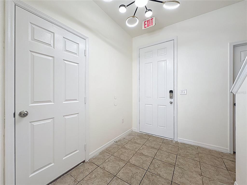 3135 Tocoa Circle Kissimmee, FL 34746 - Photo 13 of 36 a view of an entryway with the hallway