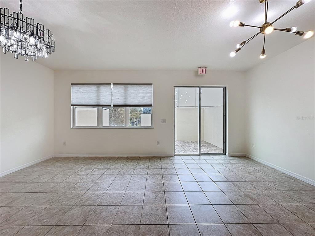 3135 Tocoa Circle Kissimmee, FL 34746 - Photo 17 of 36 a view of an empty room with a window