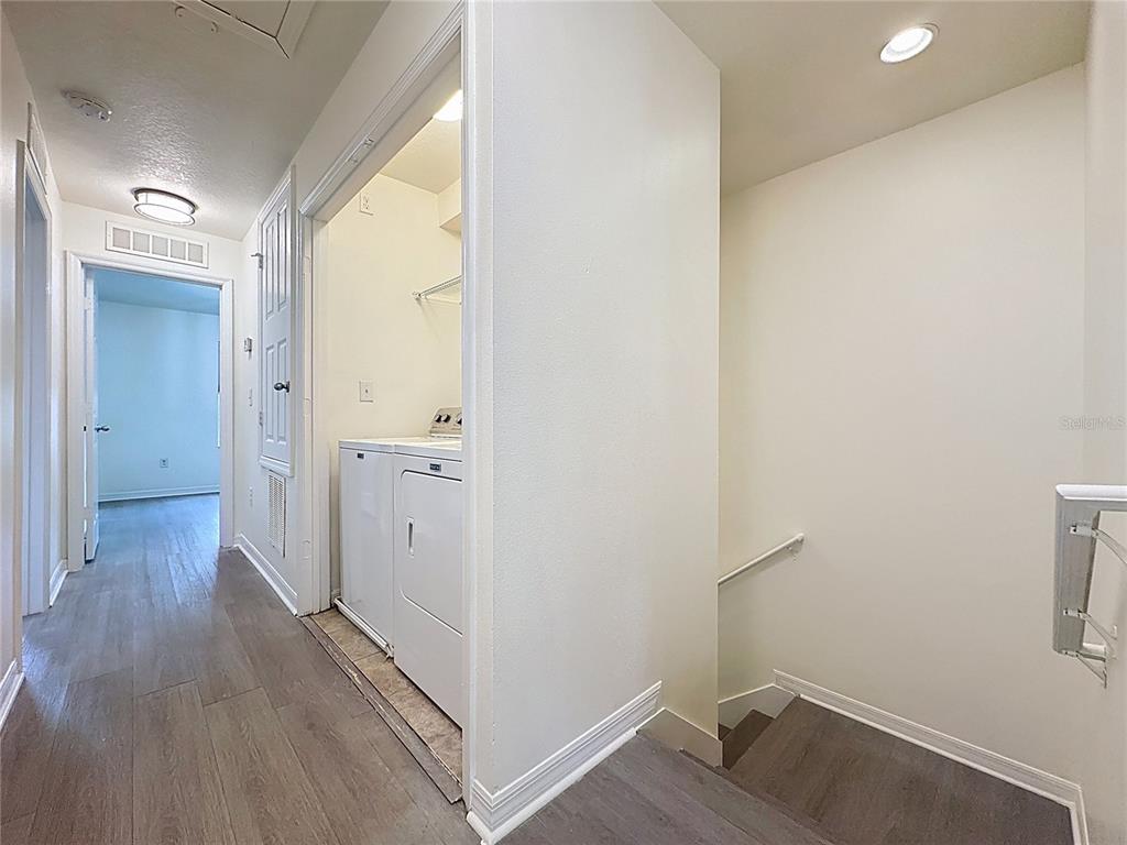 3135 Tocoa Circle Kissimmee, FL 34746 - Photo 20 of 36 a view of a hallway with wooden floor