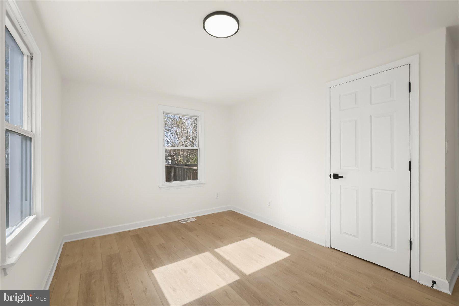 518 Church Street Baltimore, MD 21225 - Photo 14 of 27 an empty room with a window