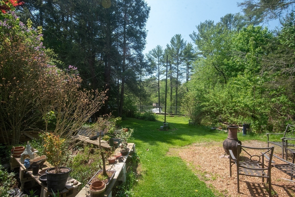 920 Worcester Road Barre, MA 01005 - Photo 14 of 40 a view of a backyard with a garden