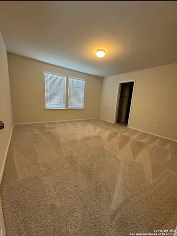 a bathroom with a sink vanity and a mirror