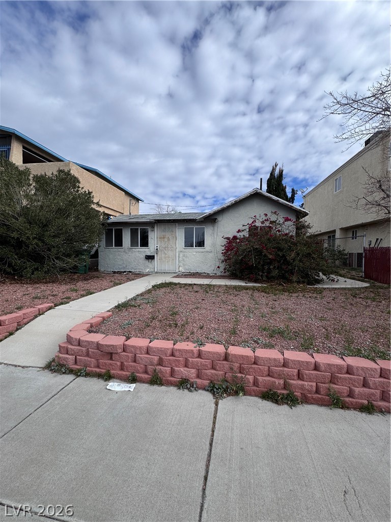View of front facade with stucco siding