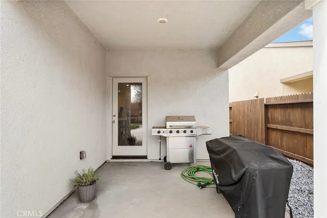 a kitchen with a refrigerator and a stove