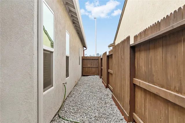 a view of a pathway of a house with wooden floor