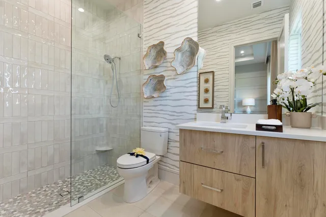a bathroom with a double vanity sink and mirror