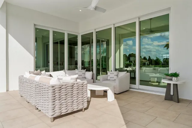 a view of swimming pool with a lounge chair