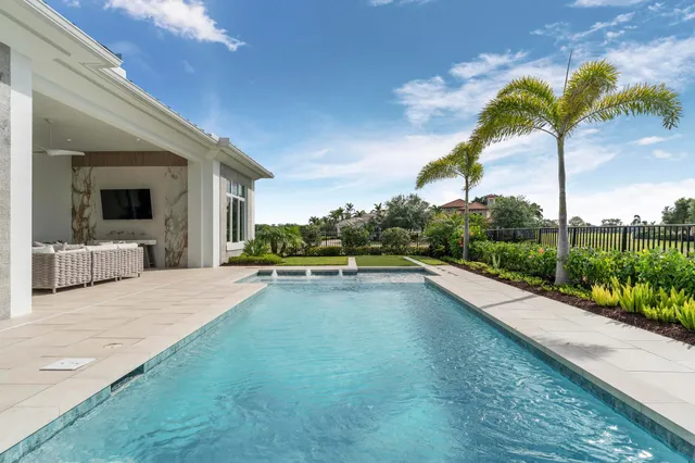 an aerial view of a house with a garden