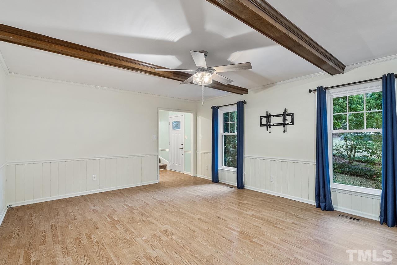 7416 Old Fox Trail Raleigh, NC 27613 - Photo 11 of 26 a view of an empty room with a window