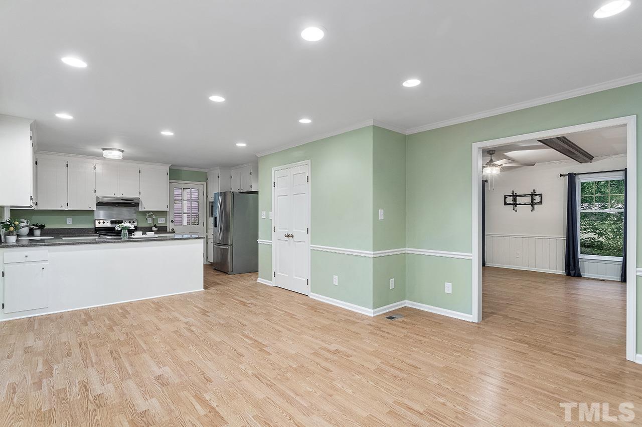 7416 Old Fox Trail Raleigh, NC 27613 - Photo 13 of 26 a view of kitchen with wooden floor
