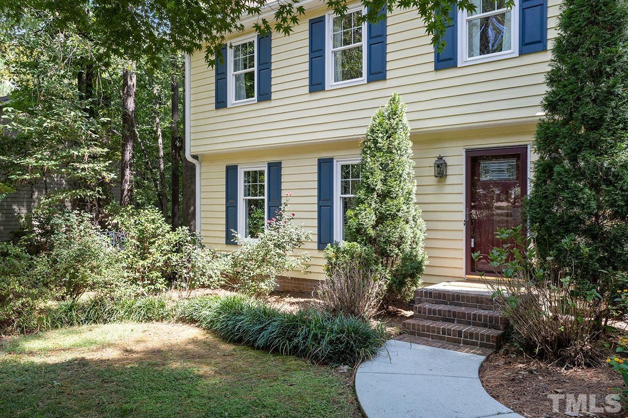 7416 Old Fox Trail Raleigh, NC 27613 - Photo 3 of 26 a front view of a house with a yard