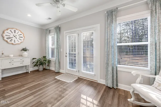 a spacious bathroom with a sink a mirror and a shower