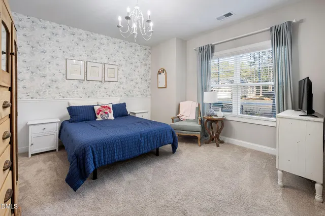 a spacious bathroom with a double vanity sink mirror and
