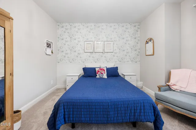 a bathroom with a shower sink and mirror