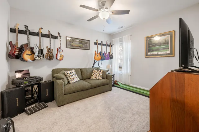 a bedroom with a bed and a table in it