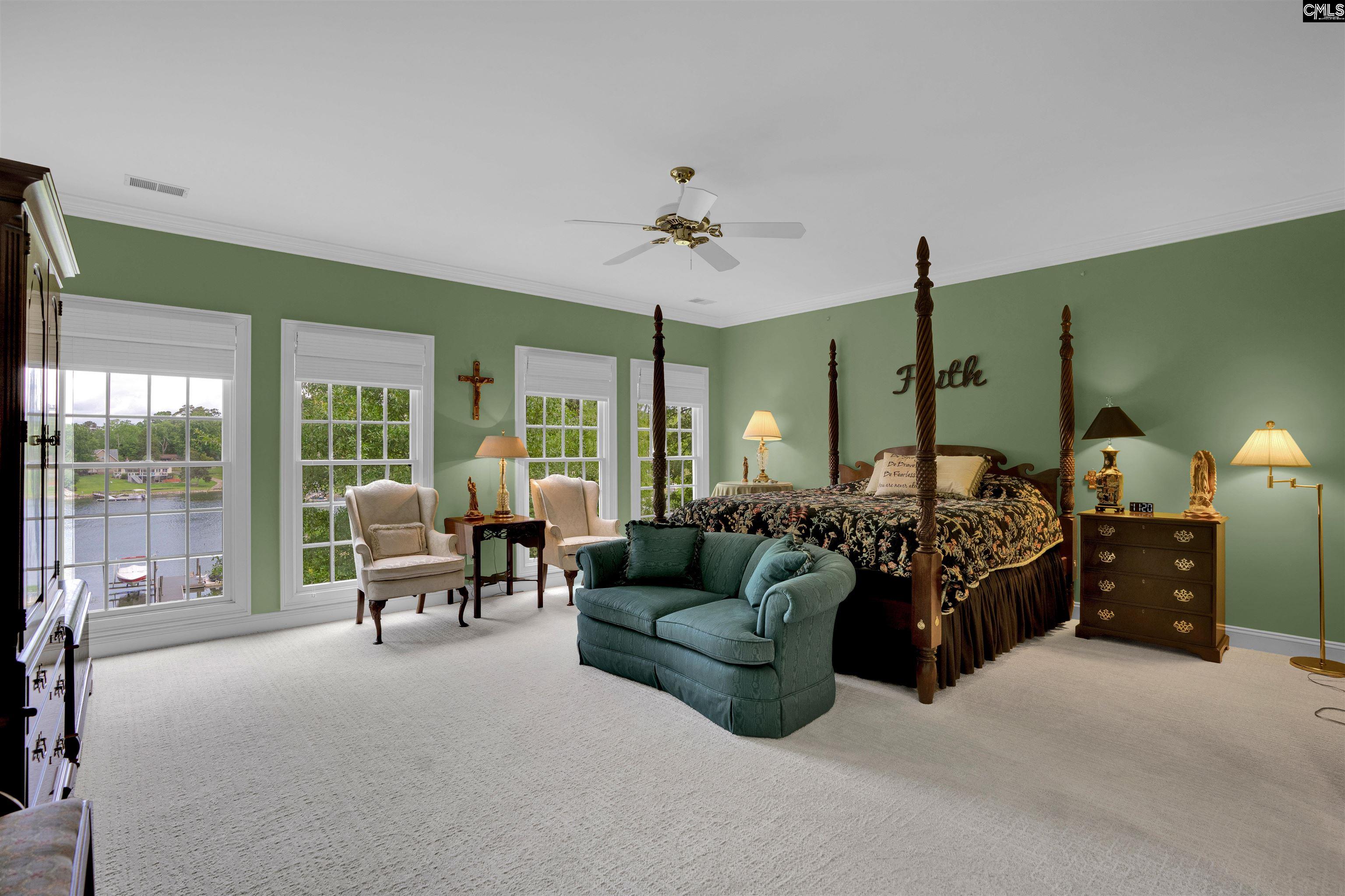 1101 Ellett Road Chapin, SC 29036 - Photo 10 of 24 a living room with furniture ceiling fan and a window
