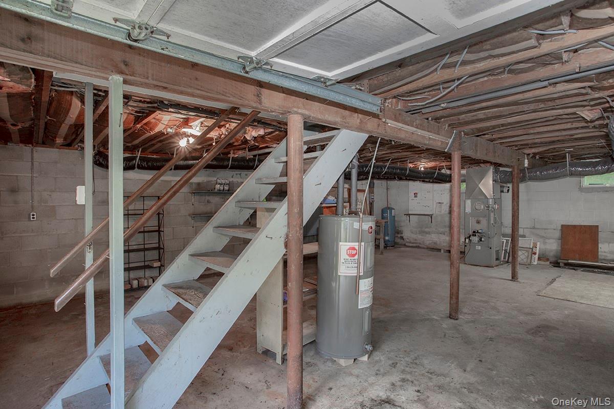 401 West Dover Road Pawling, NY 12564 - Photo 21 of 24 Garage/Basement workshop area with steps to main living area