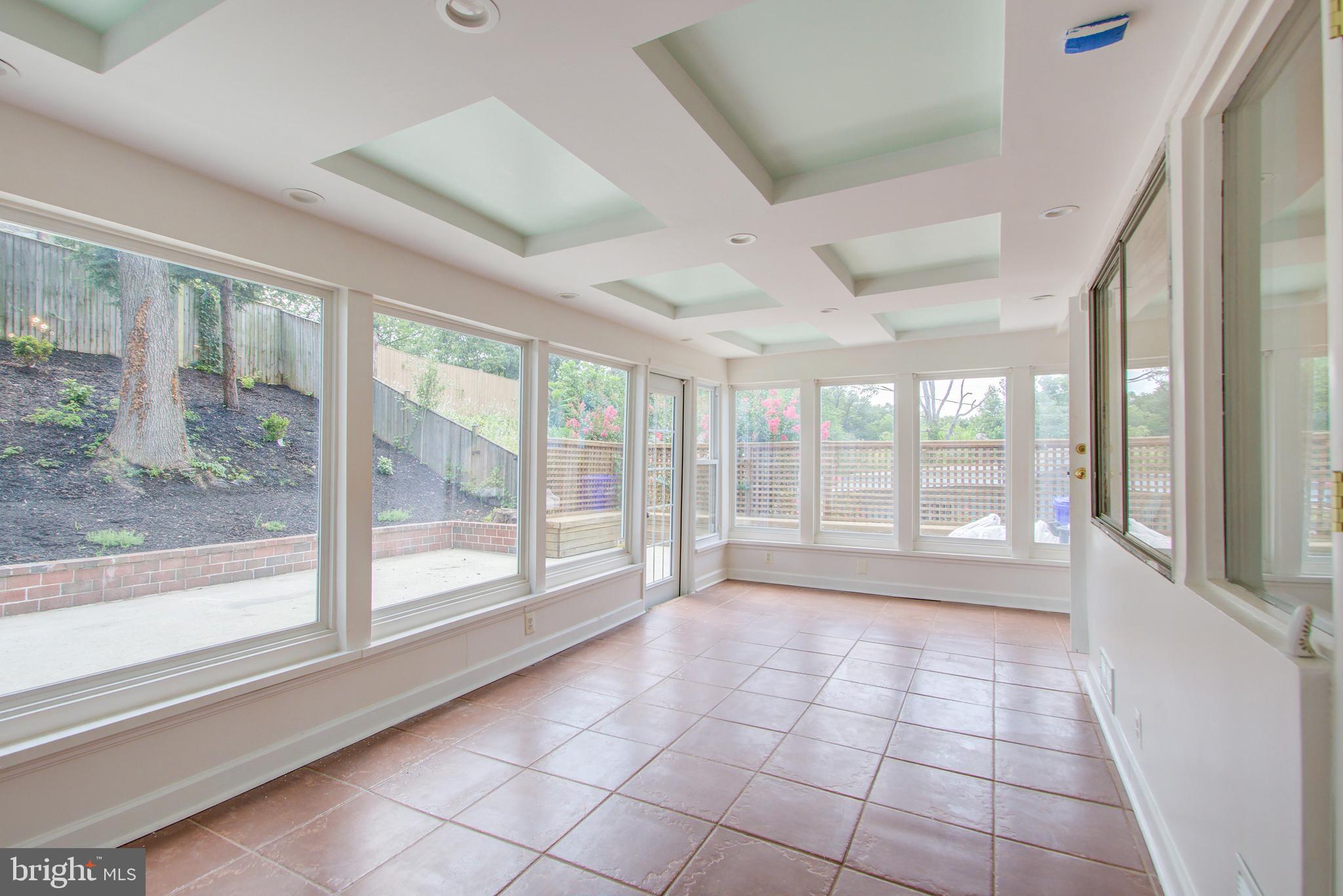 6109 Montrose Road Cheverly, MD 20785 - Photo 16 of 29 Sunroom leading to backyard