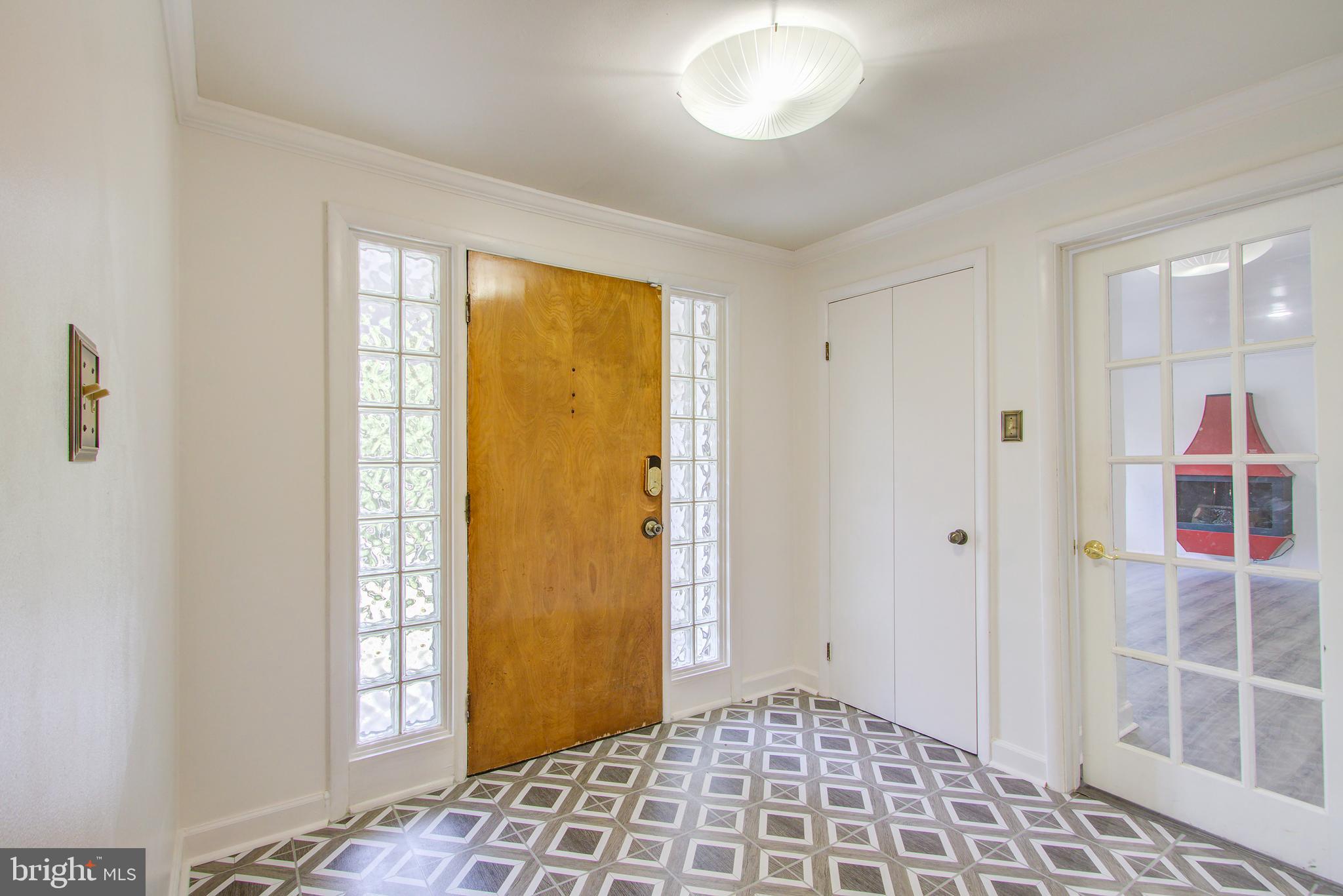 6109 Montrose Road Cheverly, MD 20785 - Photo 5 of 29 Foyer leading to Family Room Lower level