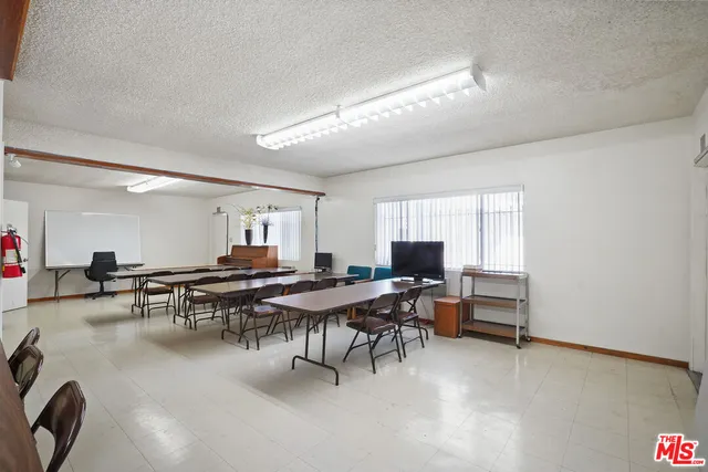 a kitchen with a stove and a refrigerator