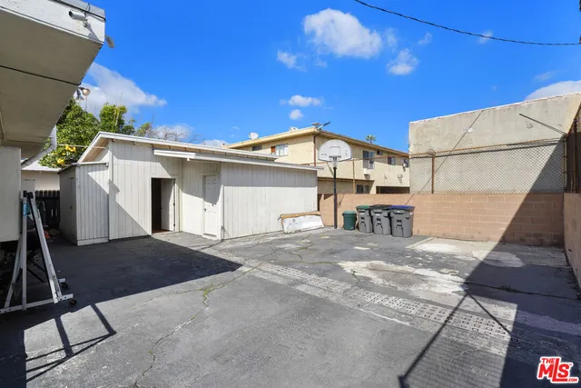 an aerial view of house with yard