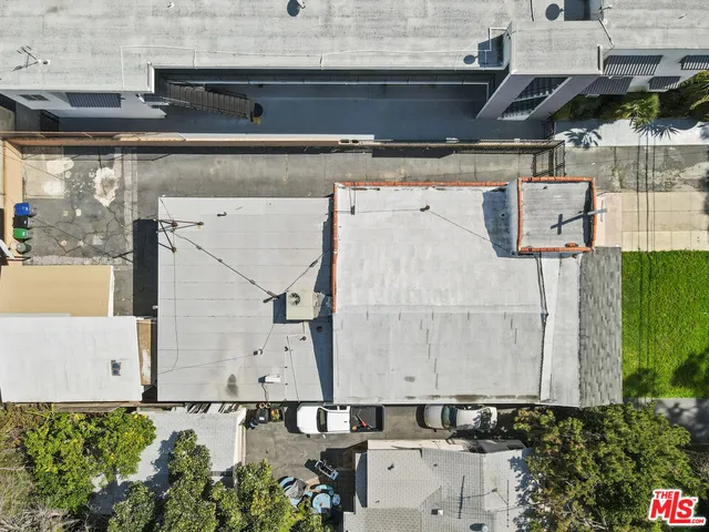 an aerial view of a city with lots of residential buildings