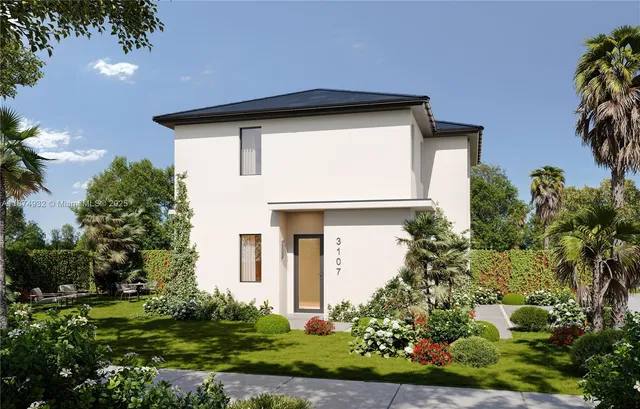 a front view of house with garden