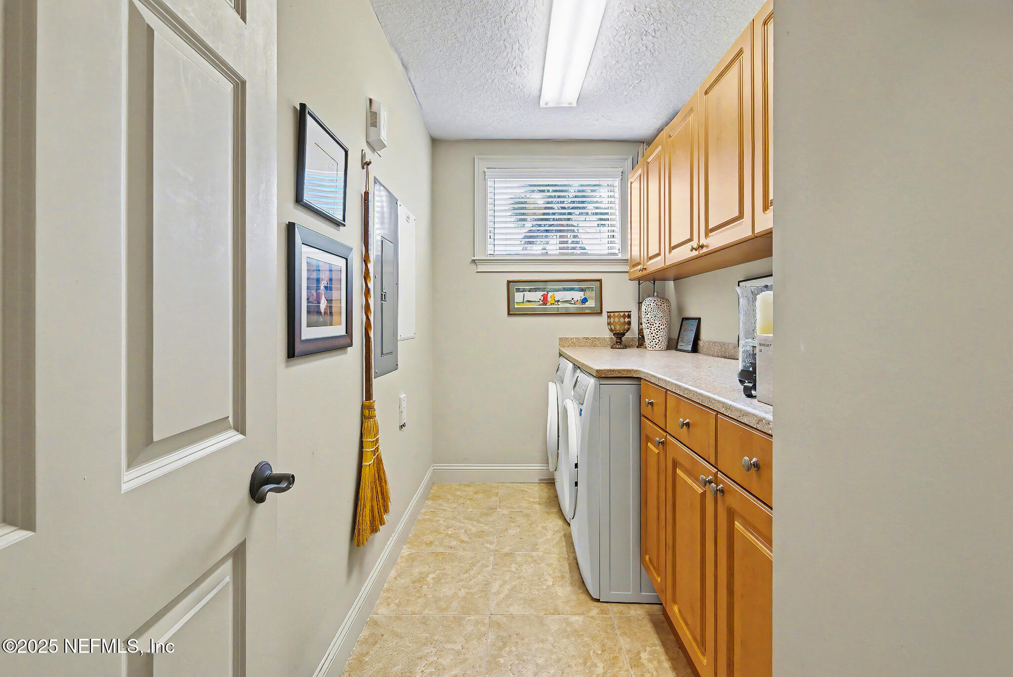 1 Radio Road, Unit 203 St. Augustine, FL 32084 - Photo 35 of 57 Laundry Room w/Built in Cabinets