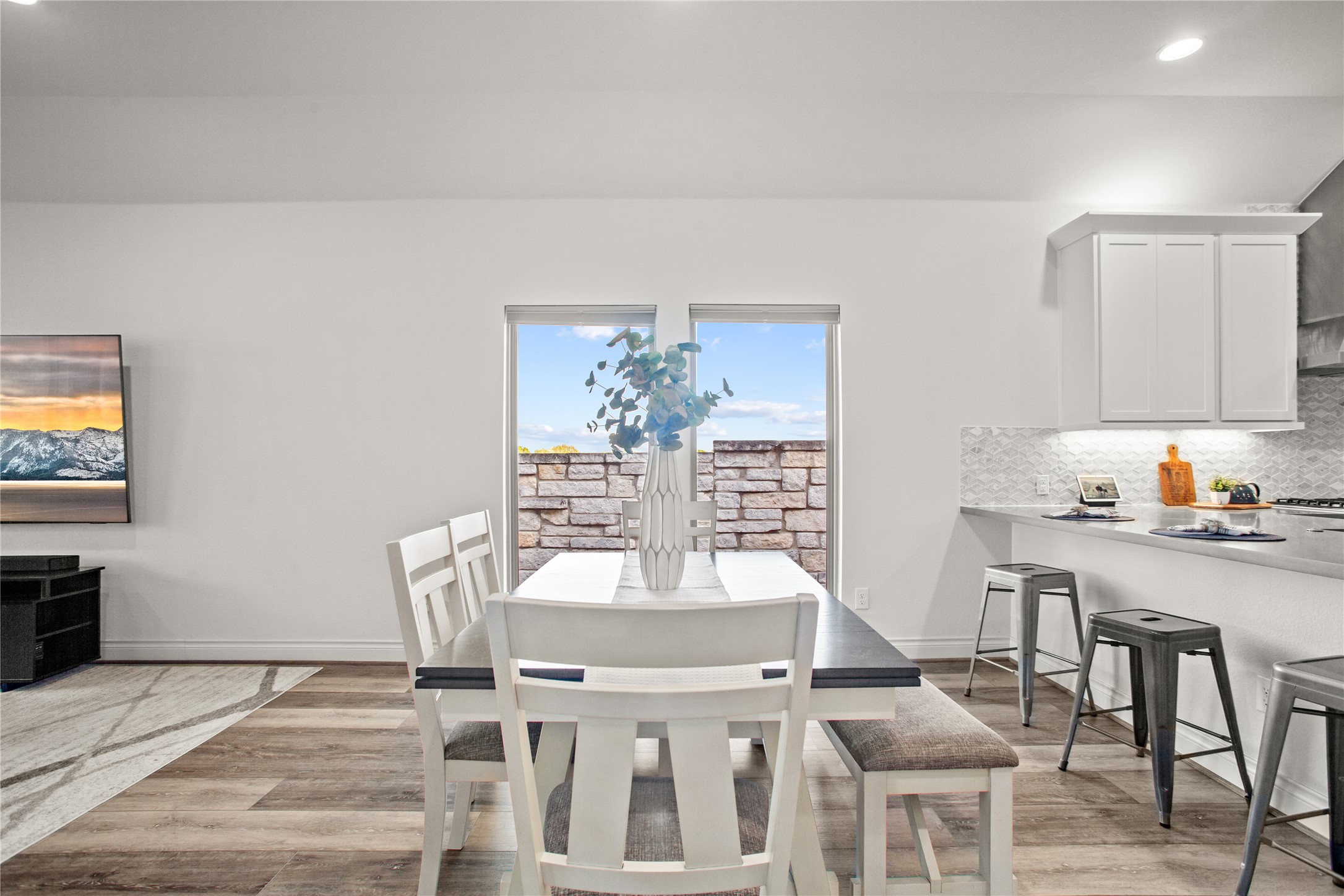 369 Cold Riv Run Kyle, TX 78640 - Photo 19 of 40 Dining room with light wood-style flooring and recessed lighting