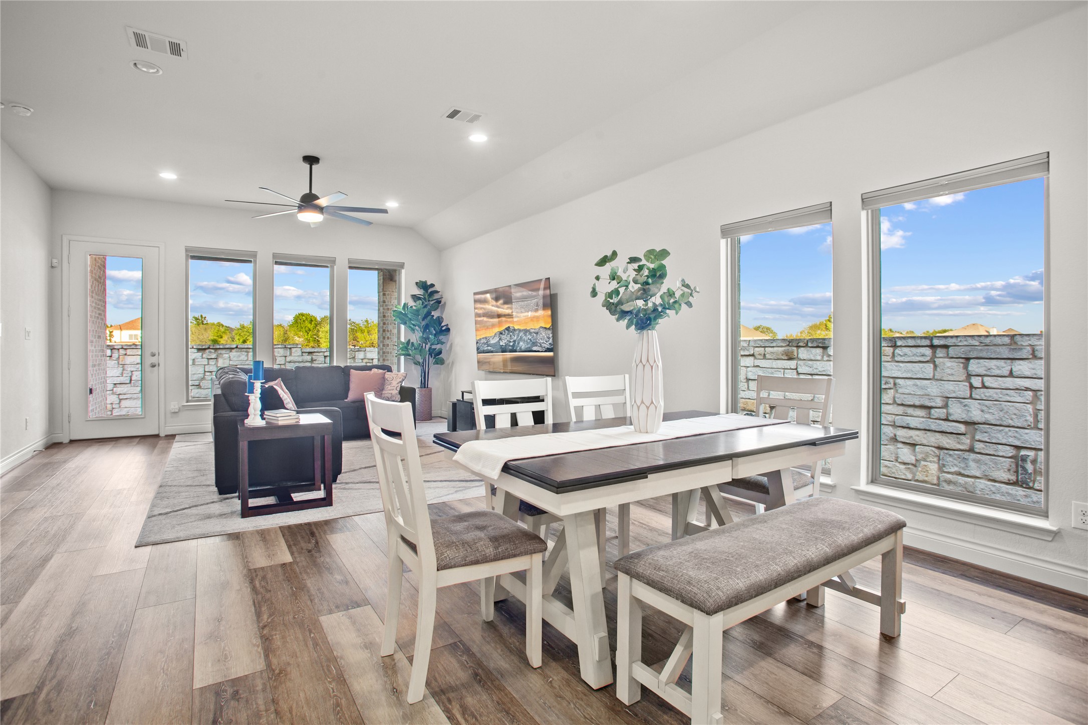 369 Cold Riv Run Kyle, TX 78640 - Photo 24 of 40 Dining area featuring light wood-style flooring, recessed lighting, and an abundance of natural light.