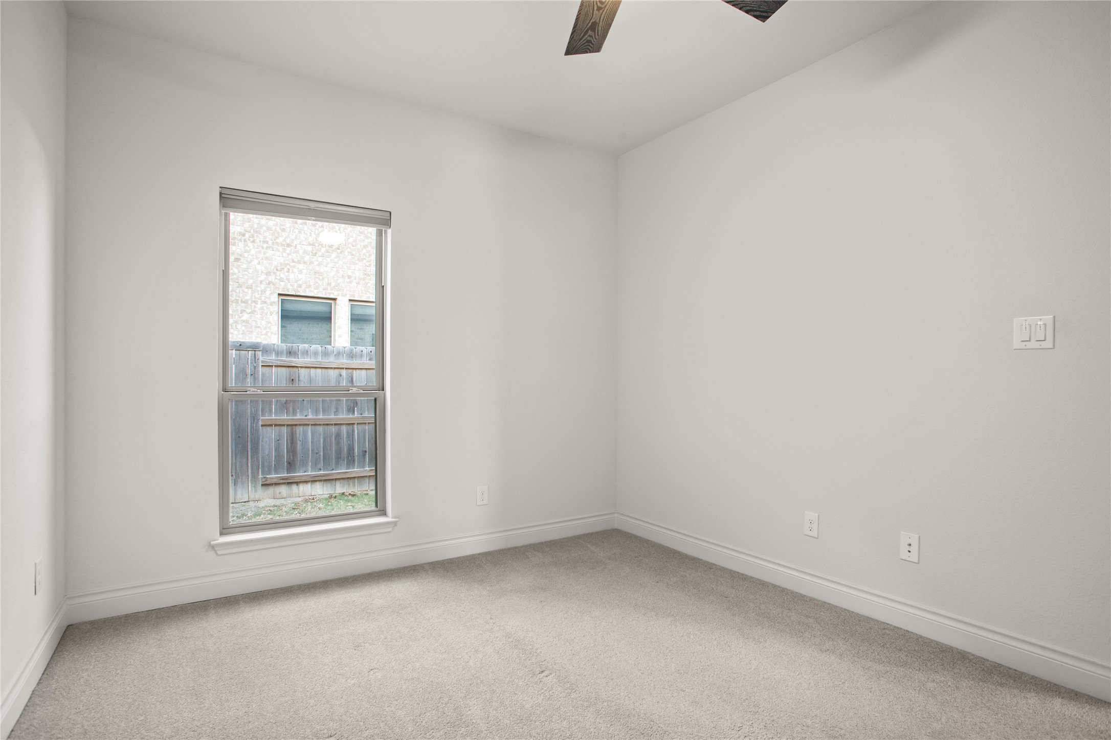 369 Cold Riv Run Kyle, TX 78640 - Photo 10 of 40 Unfurnished room featuring a ceiling fan and light carpet