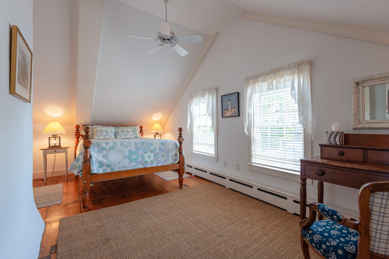 24 Cliff Road Nantucket, MA 02554 - Photo 39 of 44 a bedroom with furniture and a window