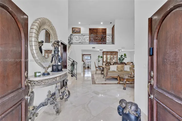 a view of living room with furniture and rug