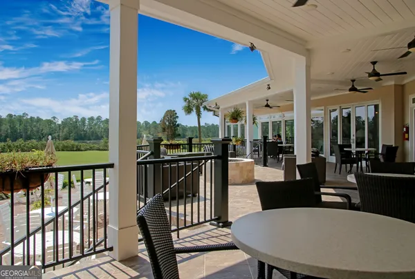 a view of a balcony dining area