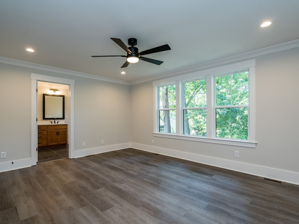3817 Wingate Drive Raleigh, NC 27609 - Photo 16 of 30 Wonderful natural light and beautiful flooring in the master suite. Master Bedroom