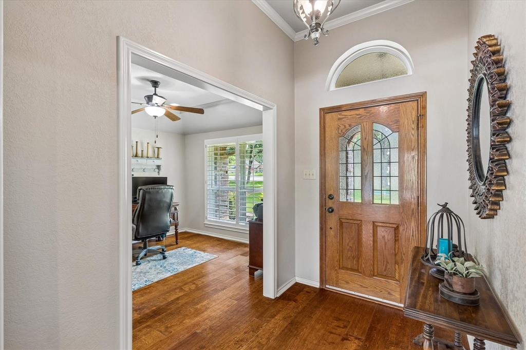 404 Moonlight Lane Keller, TX 76248 - Photo 6 of 40 a view of a livingroom with wooden floor and furniture