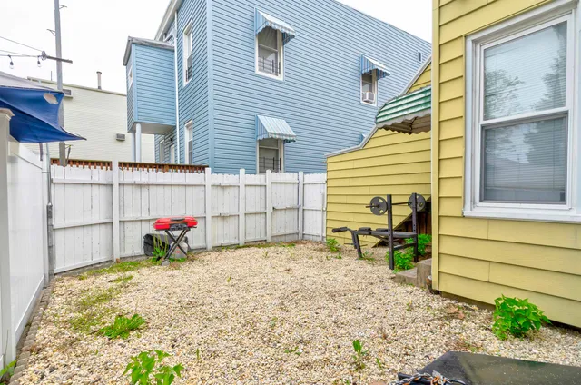 a view of a building with a street